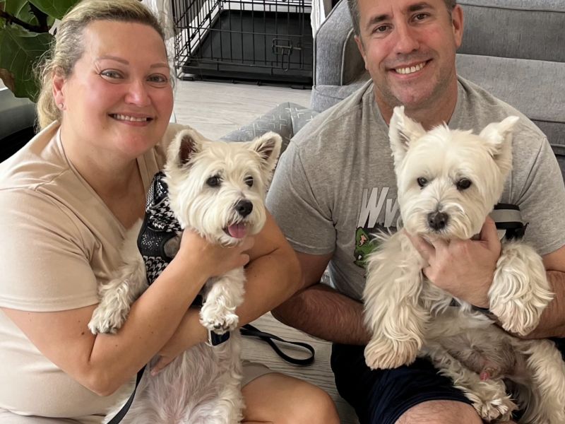 bentley with new owners and brother bailey.jpg